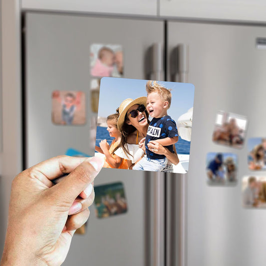 Custom photo magnets displaying personalized family photos.